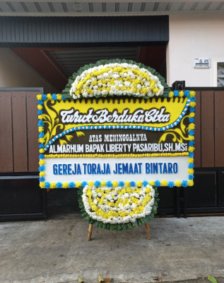 Papan Bunga Duka di Timbangan